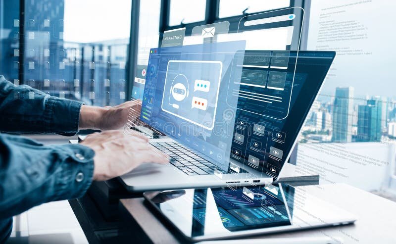 Developer working across two screens of application code and interface designs in a bright office