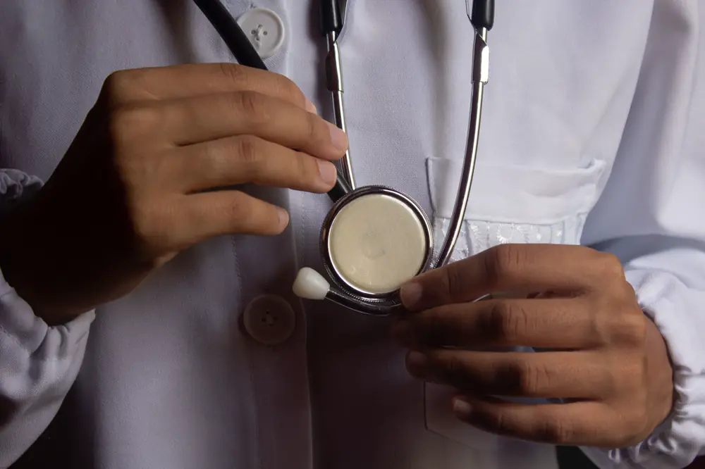 A clinician in consultation with a patient