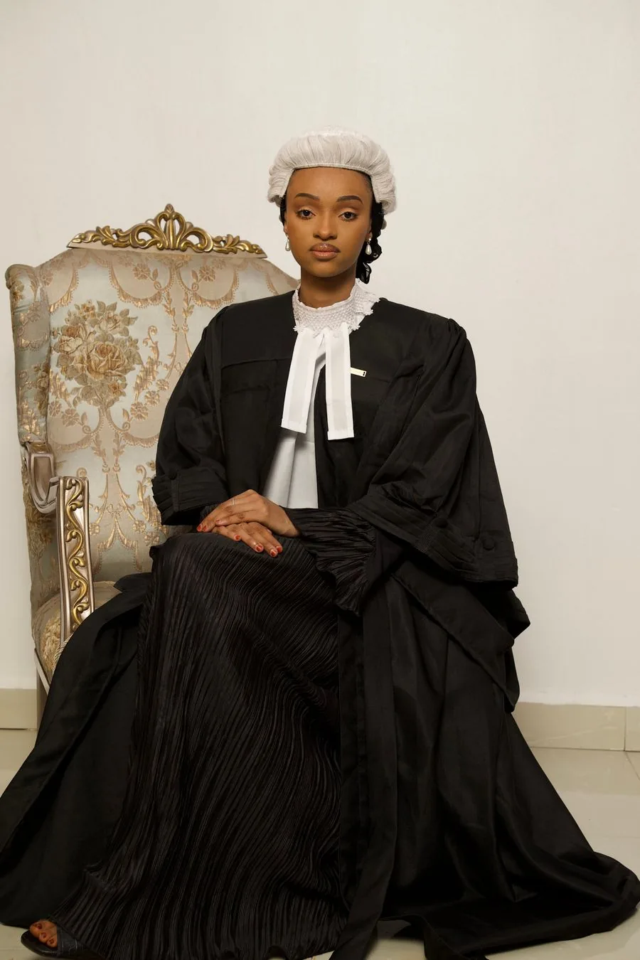 A barrister in traditional court robes