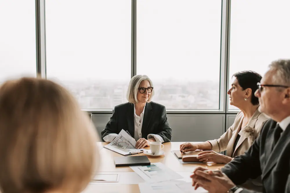 A carrier executive reviewing performance in a boardroom