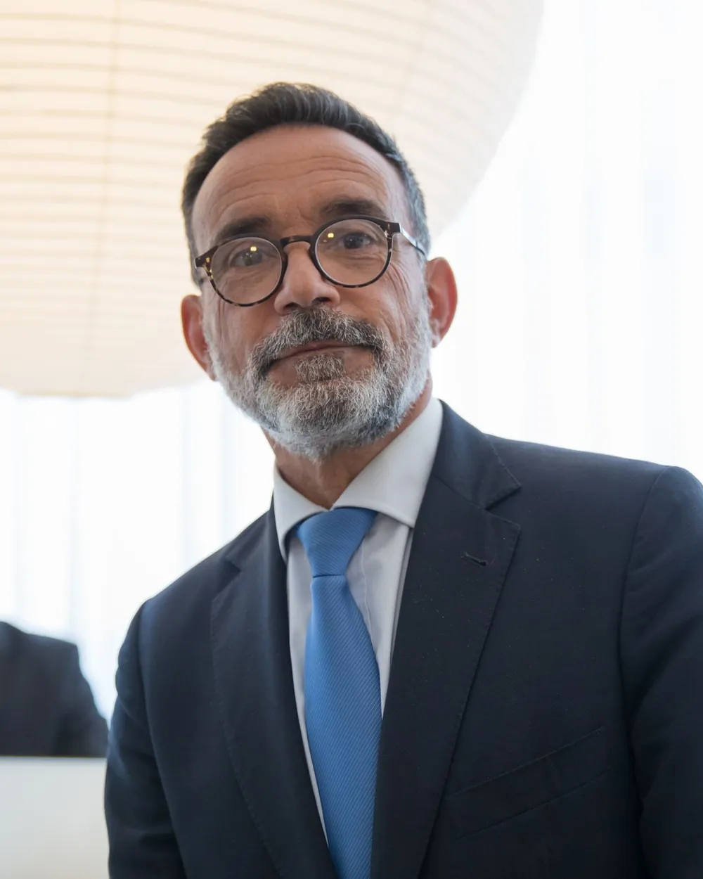 A senior executive in a modern office