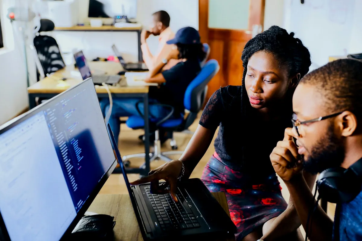 Consultants reviewing an AI roadmap on screen