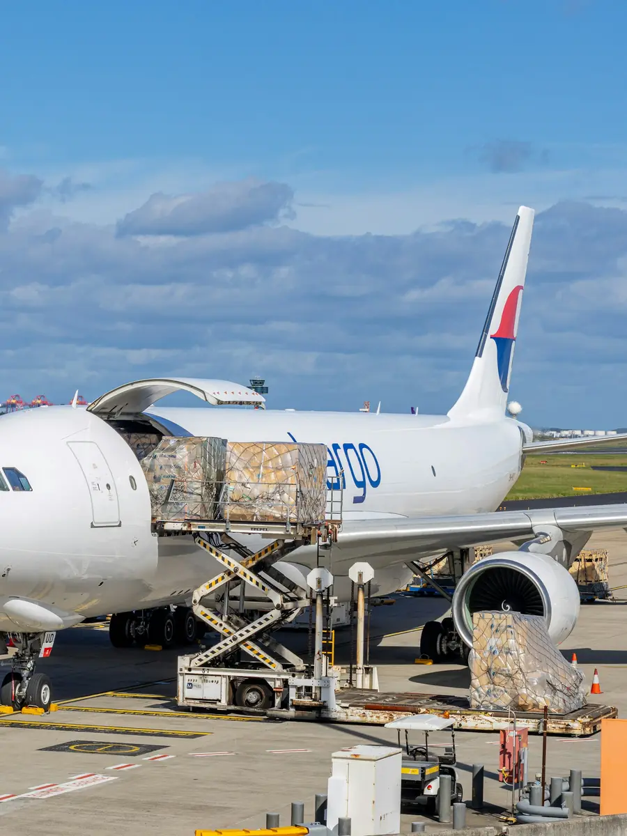 Air cargo being loaded onto a freighter aircraft