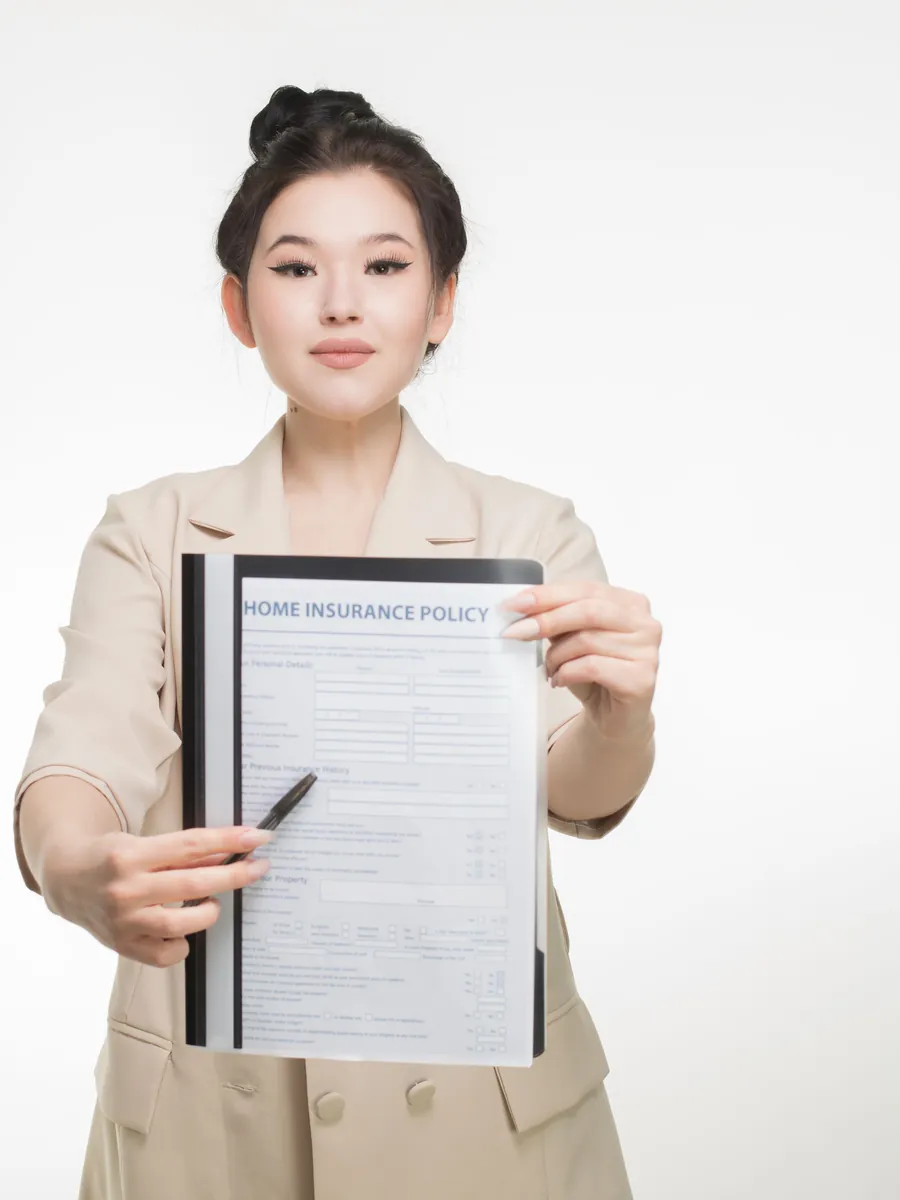 An insurance adviser presenting a policy document