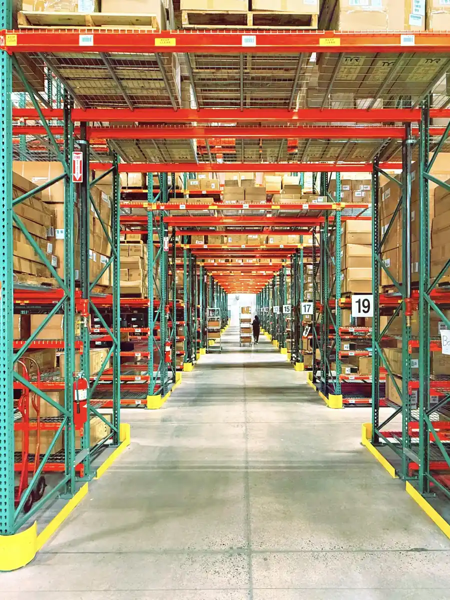 Warehouse staff checking stock levels on a tablet