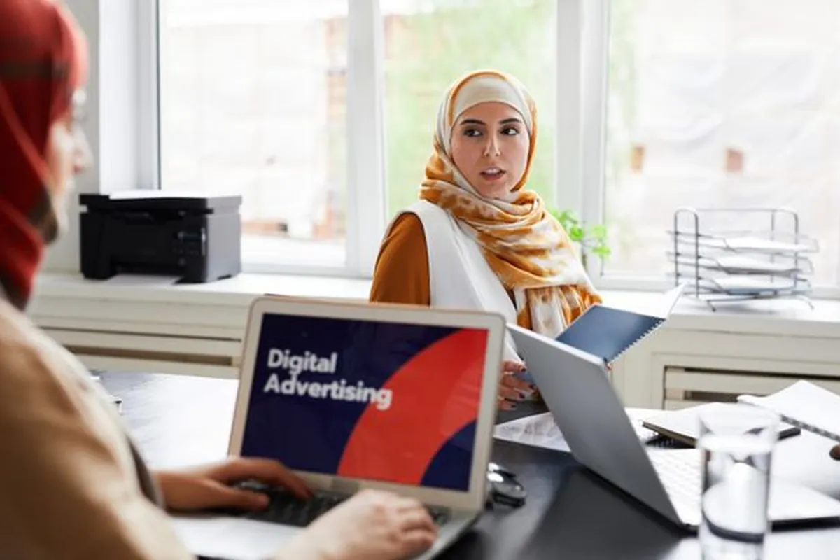 An agency strategist working on a digital advertising deck