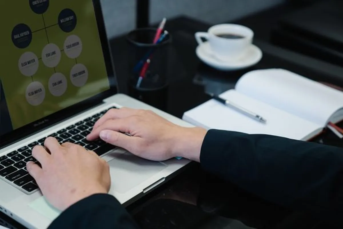A laptop showing an automated campaign workflow diagram