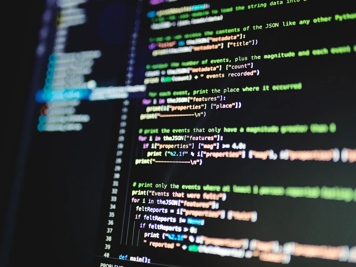 Source code on a dark screen during a modernisation project